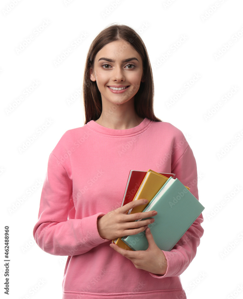 Teenage student holding books on white background Teenage student holding books on white background