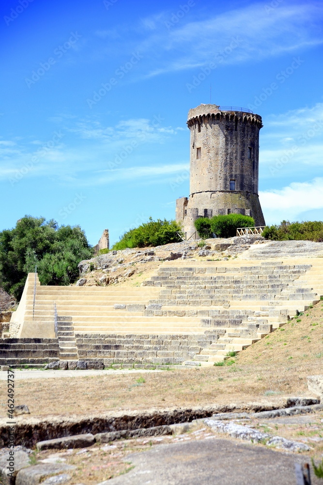 Angevin tower of Velia and ruins of the Roman theater, against the blue sky, Ascea, Cilento, Italy