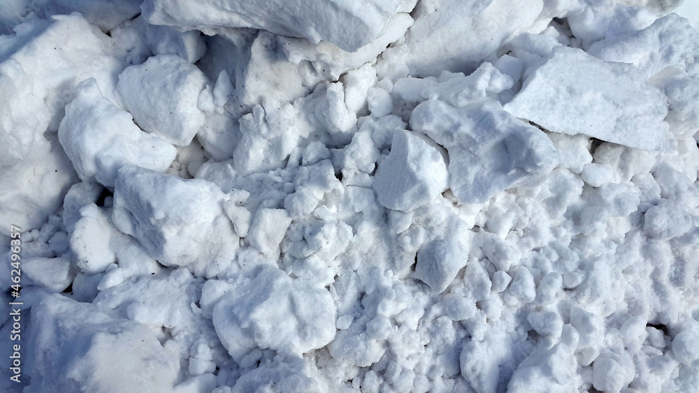 Fototapeta premium Lumps of snow. Loose snow background
