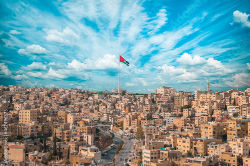 Fotografía Jordan flag in Amman, landscape view of cloudy sky background