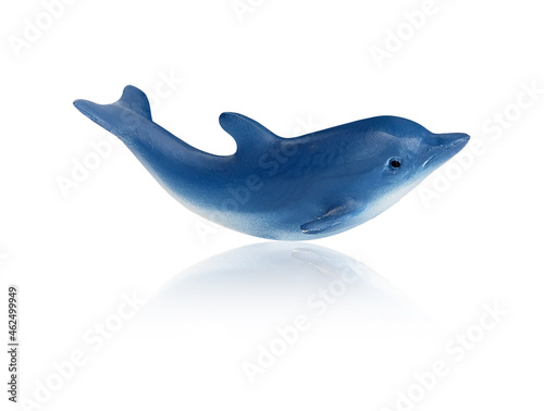 Dolphin family. Figurine isolated on white background