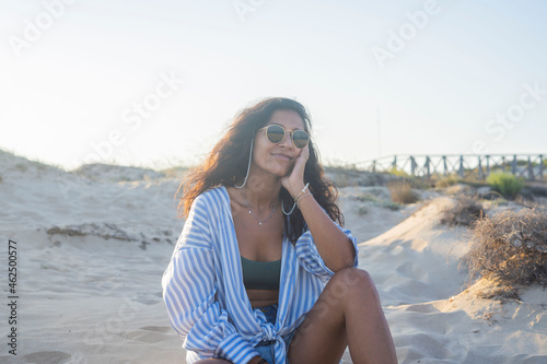 Young indian woman happy in the beach