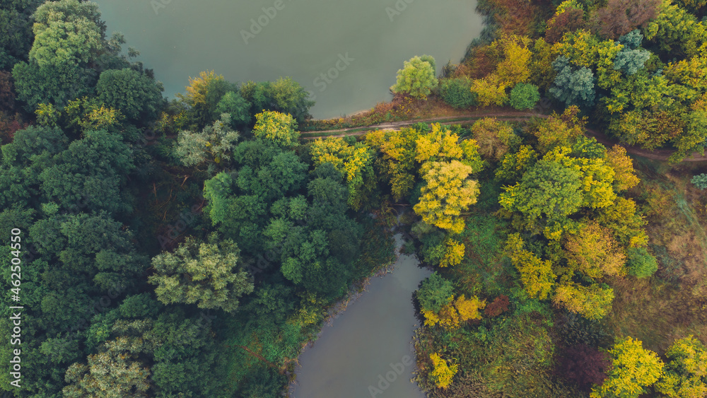 Aerial view of two lake and autumn forests on morning. Place for fishing Aerial view of two lake and autumn forests on morning. Place for fishing
