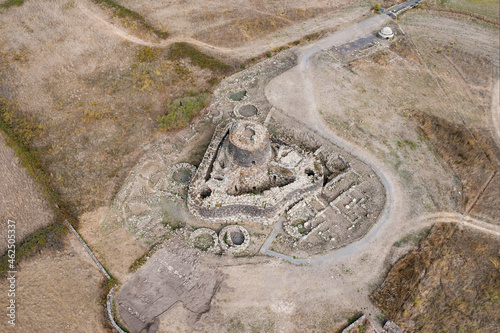 View from above, stunning aerial view of the ancient Santu Antine Nuraghe. Santu Antine Nuraghe is one of the largest Nuraghi in Sardinia, Italy. photo