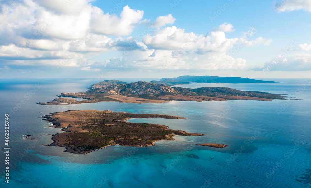 View from above, stunning aerial view the Asinara Island bathed by a turquoise water. Asinara is a small, uninhabited island that sits off the northwestern coast of Sardinia, Italy.