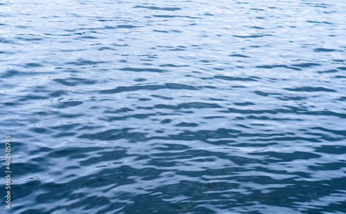 background of pond surface with clear water. small waves on  river.