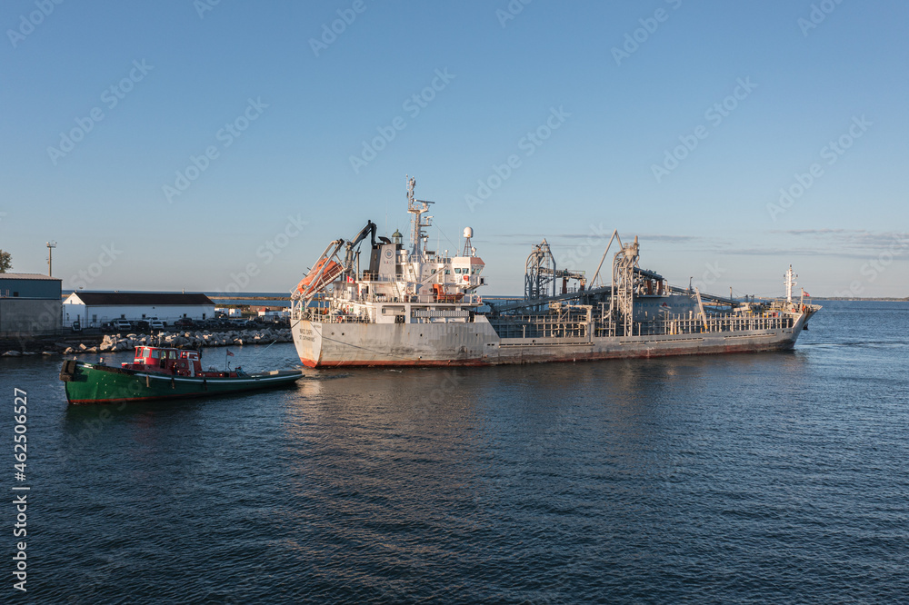 Grain Ship towed by tug Buffalo Harbor Grain Ship towed by tug Buffalo Harbor