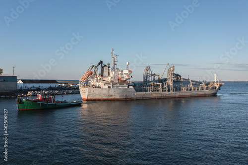 Grain Ship towed by tug Buffalo Harbor