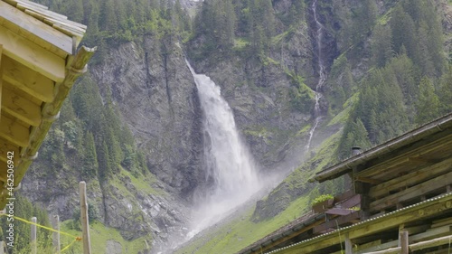 Waterfall in the mountains. Staeubifall, Staublifall powerful waterfall near Unterschächen, Klausenpass, Canton Uri, Switzerland. photo