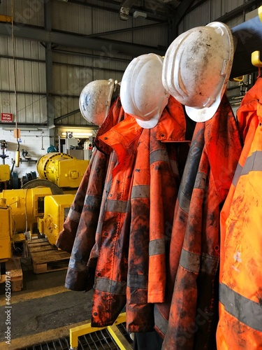 Fényképezés dirty and greasy hi viz workwear in an industrial environment