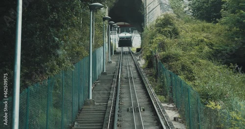 Public transport of a cable car located in Bilbao, Spain. Tracks of an aerial cable car that goes up. Subjective plane.