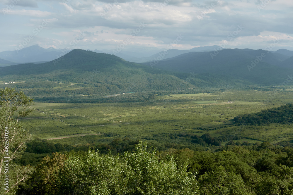 Fototapeta premium Mountain landscape with green valleys. Caucasian State Natural Biosphere Reserve named after Kh.G. Shaposhnikov. Lago-Naki plateau. Russia.