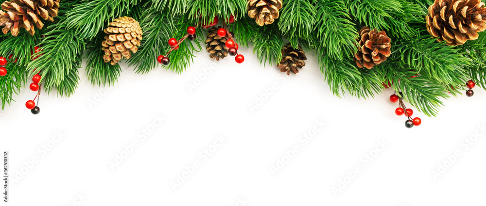 Fototapeta premium Christmas and New Year background with green spruce branches, white banner, top view, copy space