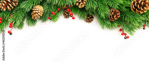 Christmas and New Year background with green spruce branches, white banner, top view, copy space