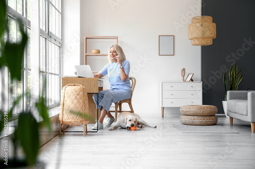 Mature woman with cute Labr...
