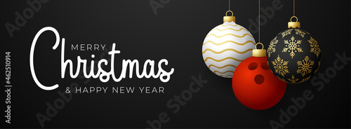 bowling Christmas card. Merry Christmas sport greeting card. Hang on a thread bowling ball as a xmas ball and golden bauble on black horizontal background. Sport Vector illustration.