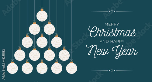 volleyball Christmas and new year greeting card bauble tree. Creative Xmas tree made by volleyball ball on black background for Christmas and New Year celebration. Sport greeting card