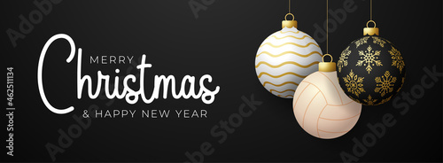 volleyball Christmas card. Merry Christmas sport greeting card. Hang on a thread volleyball ball as a xmas ball and golden bauble on black horizontal background. Sport Vector illustration.