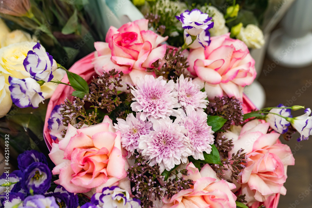 Fototapeta premium top view. bouquet of colorful bright fresh flowers. traditional gift for a woman