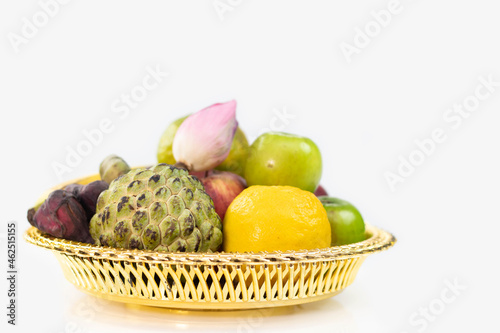 Golden Tray Pooja Ki Thali With Fruits Like Sev, Santara, Ber, Custard Apple shareepha. Theme For Diwali, Navratri, Dussehra Puja, Deepawali, Karva Chauth, Teej, Ganesh Chaturthi Or Shubh Deepavali photo