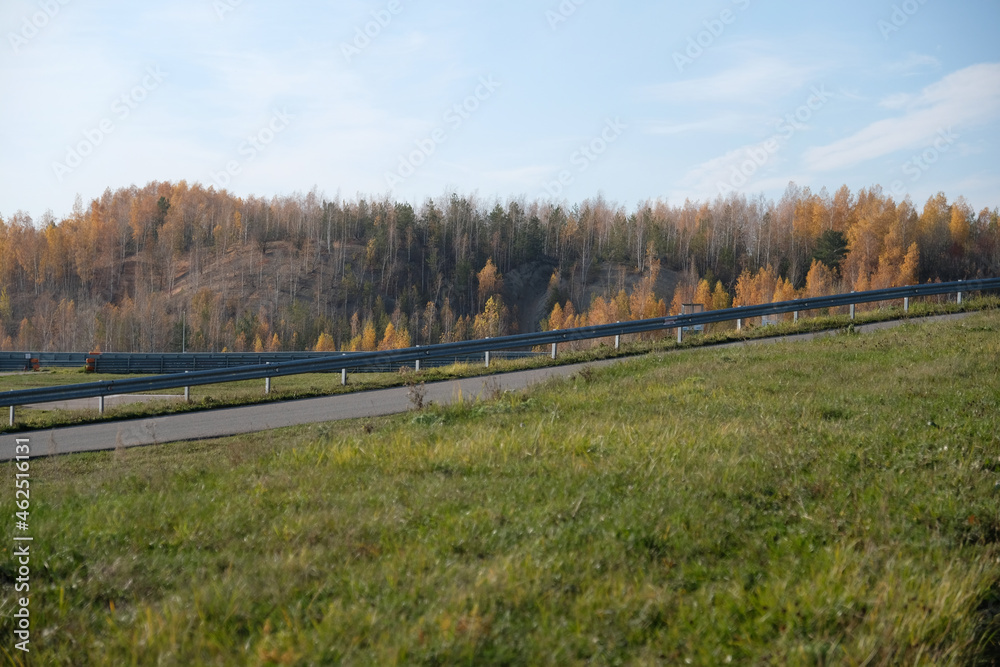 landscape with a fence of road