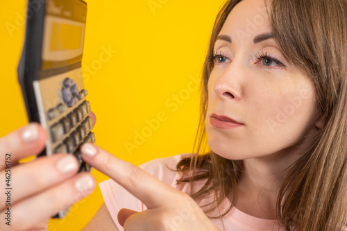 Woman with calculator. Girl...