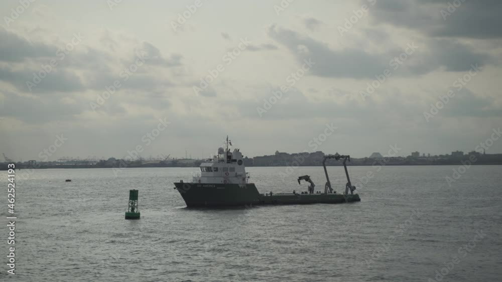 Statue of liberty and sailing boat at the sunset. Travel industry, democracy and freedom concept Statue of liberty and sailing boat at the sunset. Travel industry, democracy and freedom concept