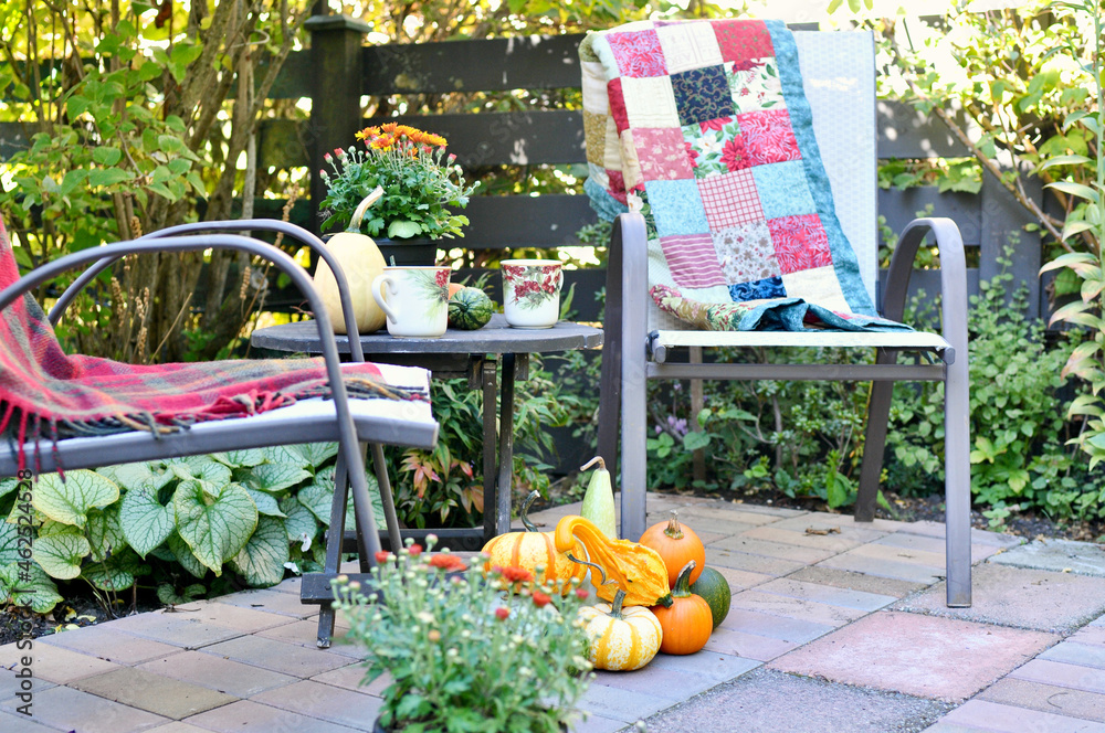 Outdoor patio seating for cozy fall festivals with harvest decorations