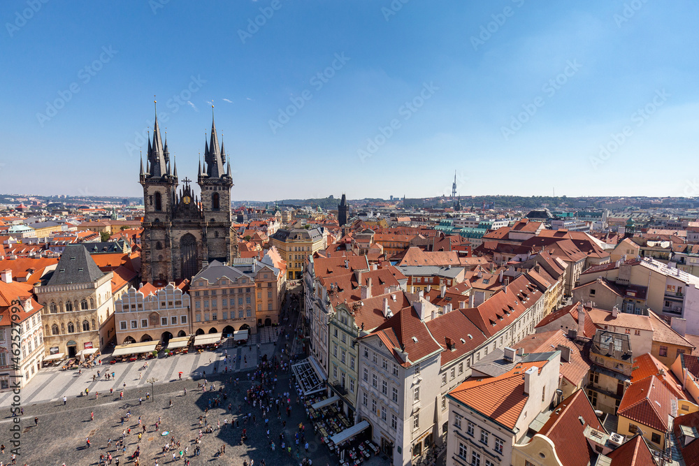 Landscape view of the old town square and the Church of our Lady Before Tyn from the Astronomical Clock in Prague.