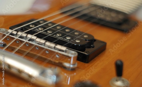 Streams and Bridges. Closeup shot of electric guitar with bridge, pickups and sreings