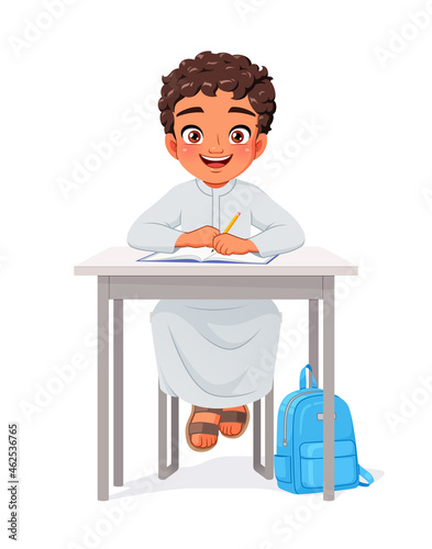 Happy Arab boy sitting at desk. Cartoon vector illustration.