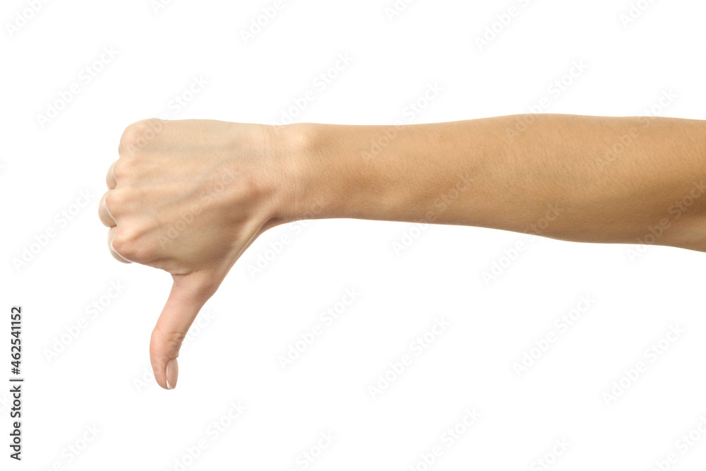 Thumb down. Woman hand gesturing isolated on white Thumb down. Woman hand gesturing isolated on white