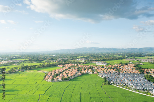 Land or landscape of green field in aerial view. Include agriculture farm, house building, village. That real estate or property. Plot of land for agent, realtor to sale, rent or buy in Chiang Mai.
