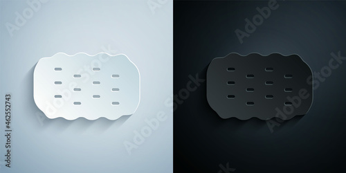 Paper cut Sponge icon isolated on grey and black background. Wisp of bast for washing dishes. Cleaning service logo. Paper art style. Vector