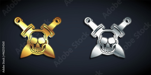 Gold and silver Crossed medieval sword with skull icon isolated on black background. Medieval weapon. Long shadow style. Vector