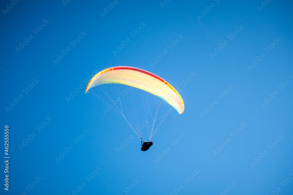 paragliding flight in the mountains. Le Grand-Bornand, France paragliding flight in the mountains. Le Grand-Bornand, France