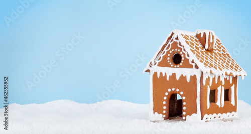 Christmas greeting card with gingerbread house photo