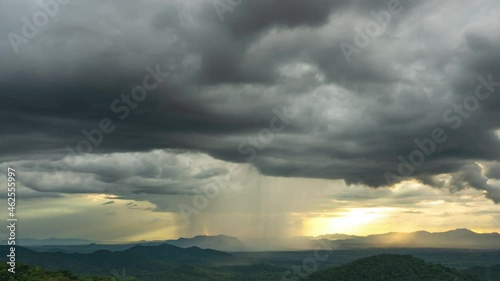 Time lapse Nature environment Dark sky Big clouds Black moving storm clouds Thunderstorms on the horizon Time lapse Giant storms Fast moving Movie time Mea Mo, Lam pang Thailand. photo