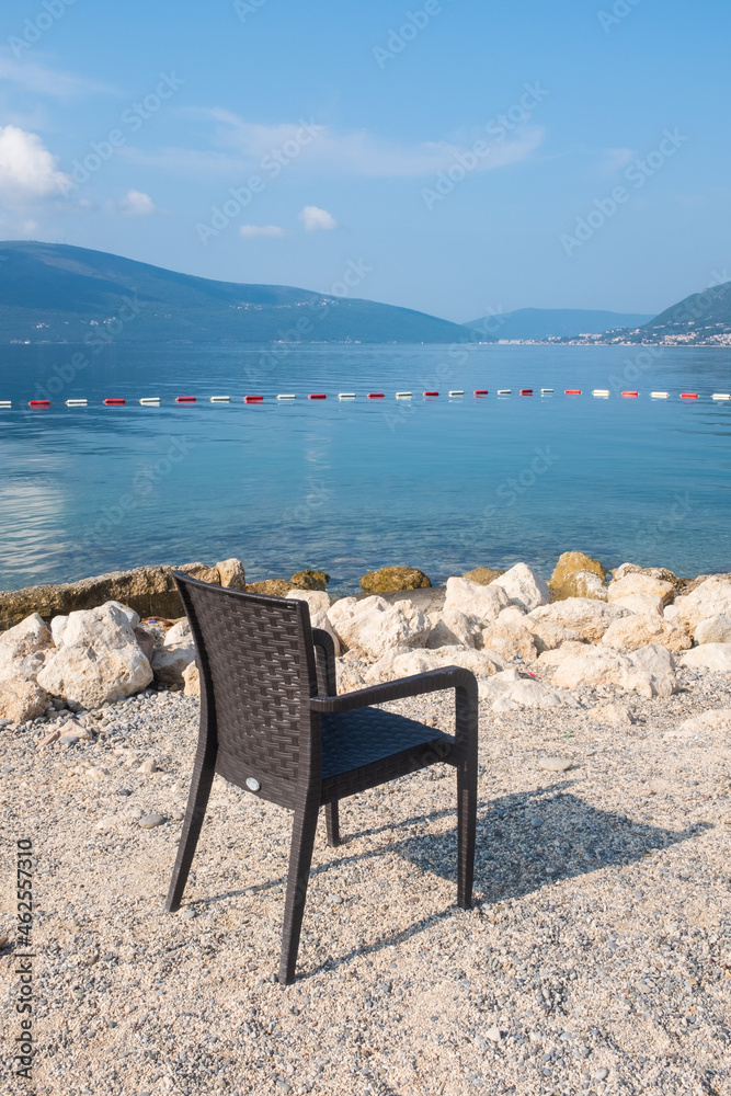 An empty  beach chair by the Adriatic seaside in Montenegro.
