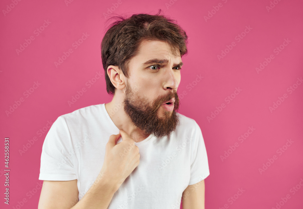 Man in a white t-shirt hand gestures close-up Man in a white t-shirt hand gestures close-up