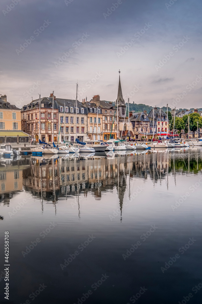 Historic center with the canal of the port of the city of Honfleur and its typical houses, located in Normandy, France