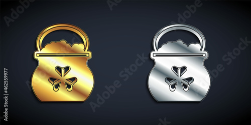 Gold and silver Pot of gold coins icon isolated on black background. Happy Saint Patricks day. National Irish holiday. Long shadow style. Vector
