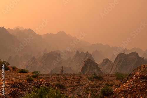 beautiful mountains of koh e sulaiman in Punjab , Pakistan, landscape of foggy mountains with road and blue sky
