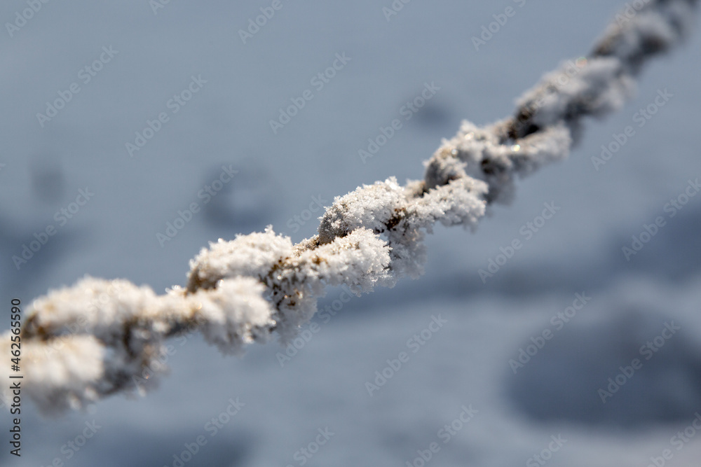 A frosted iron chain. Selective focus. A frosted iron chain. Selective focus.