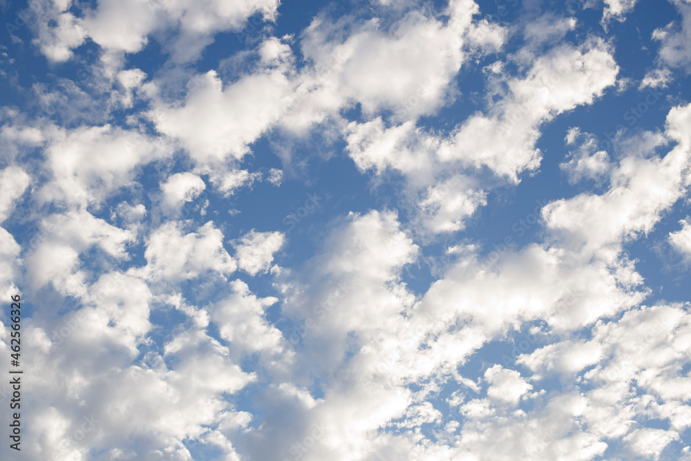 white fluffy clouds on a blue sky during the months of spring in Adelaide, South Australia