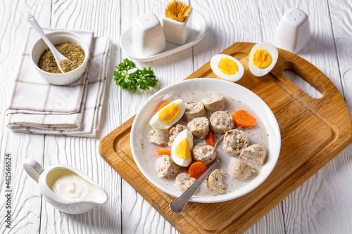 Zurek polish rye soup on a white wooden background