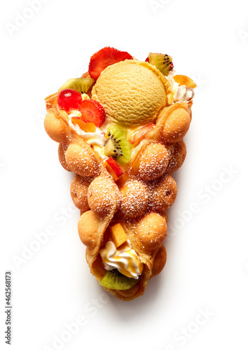 Egg waffle with ice cream and berries with fruits photo