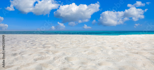 Closeup sea sand beach. Panoramic beach landscape. Inspire tropical beach seascape horizon. Blue cloudy sunny sky calmness tranquil relaxing sunlight summer mood. Vacation traveling holiday banner