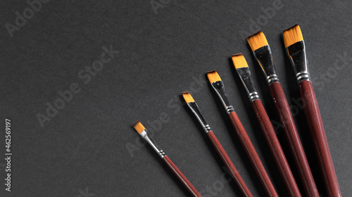 brushes for painting. brushes on a black background. accessories for the artist