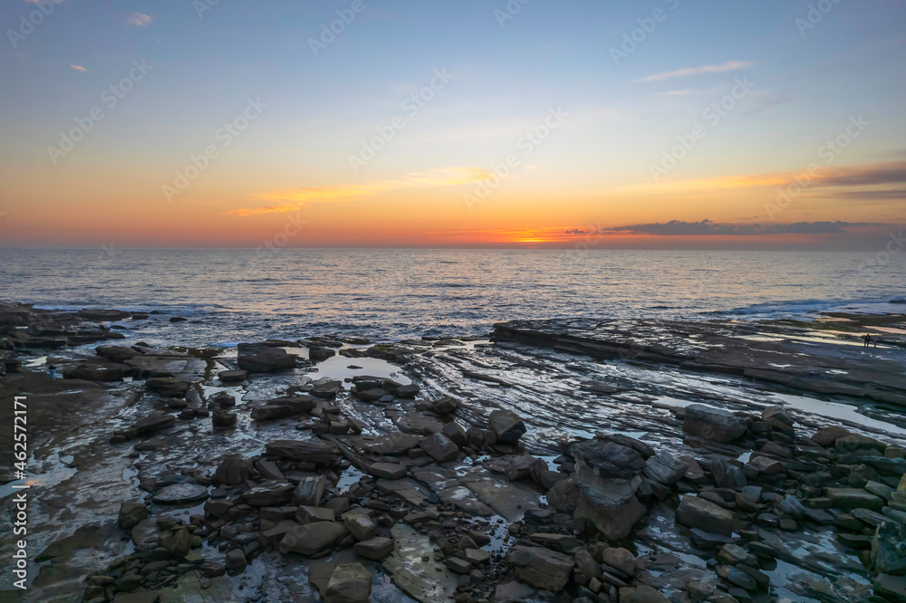 Obraz premium Aerial Sunrise Seascape at Rocky Inlet